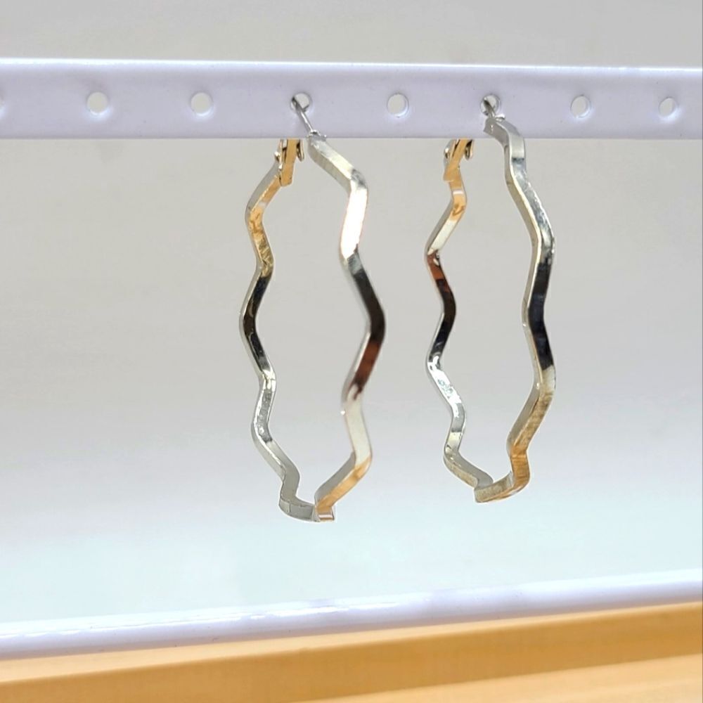 Wavy hoop earrings,  silvertone